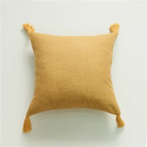 funda cojín lino amarillo borlas 45x45 - FundasCojines.com